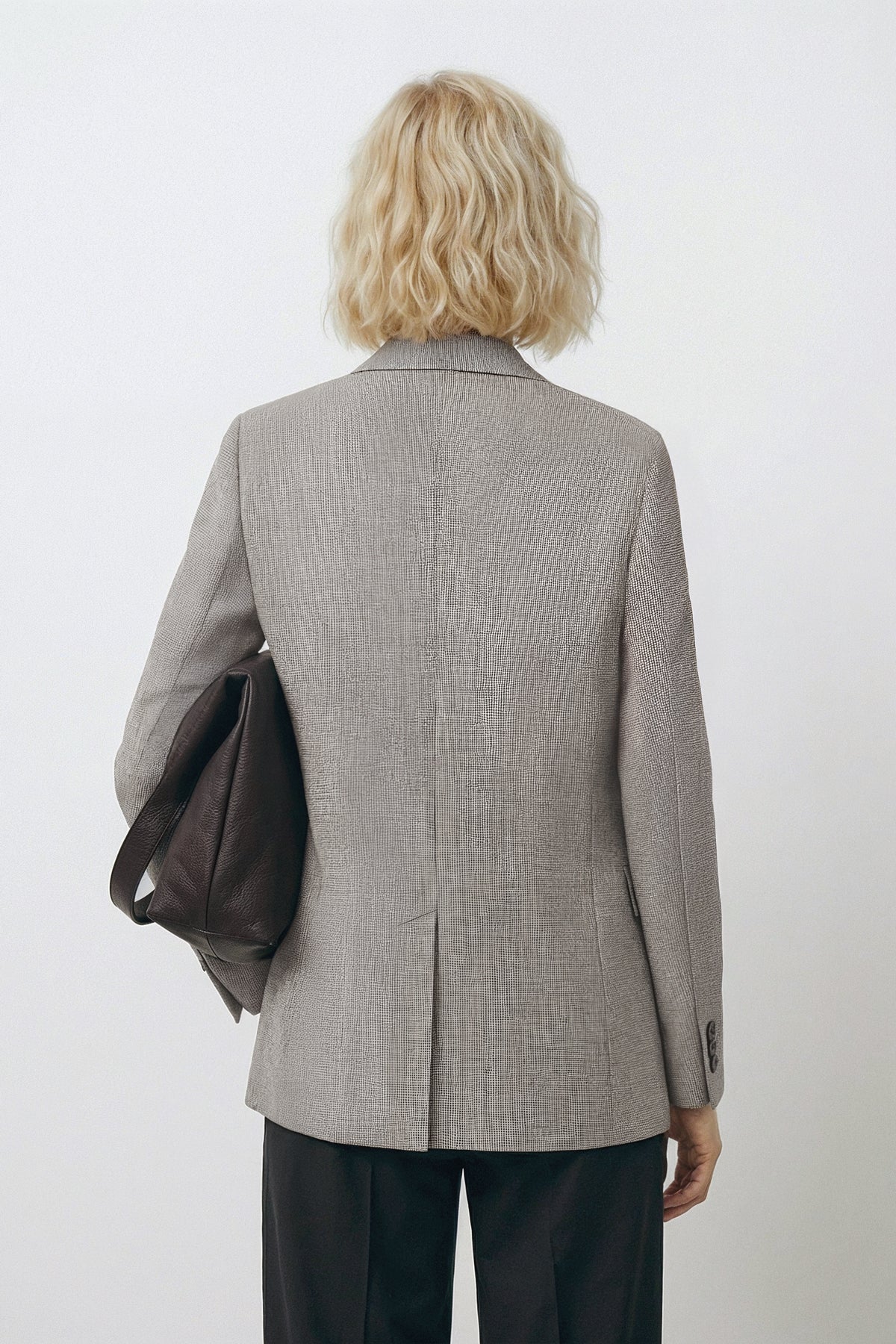 Americana mujer gris espalda