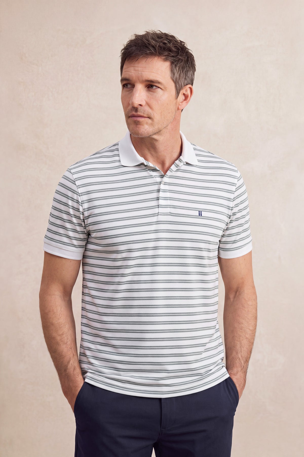 Camisa polo masculina com listras verdes