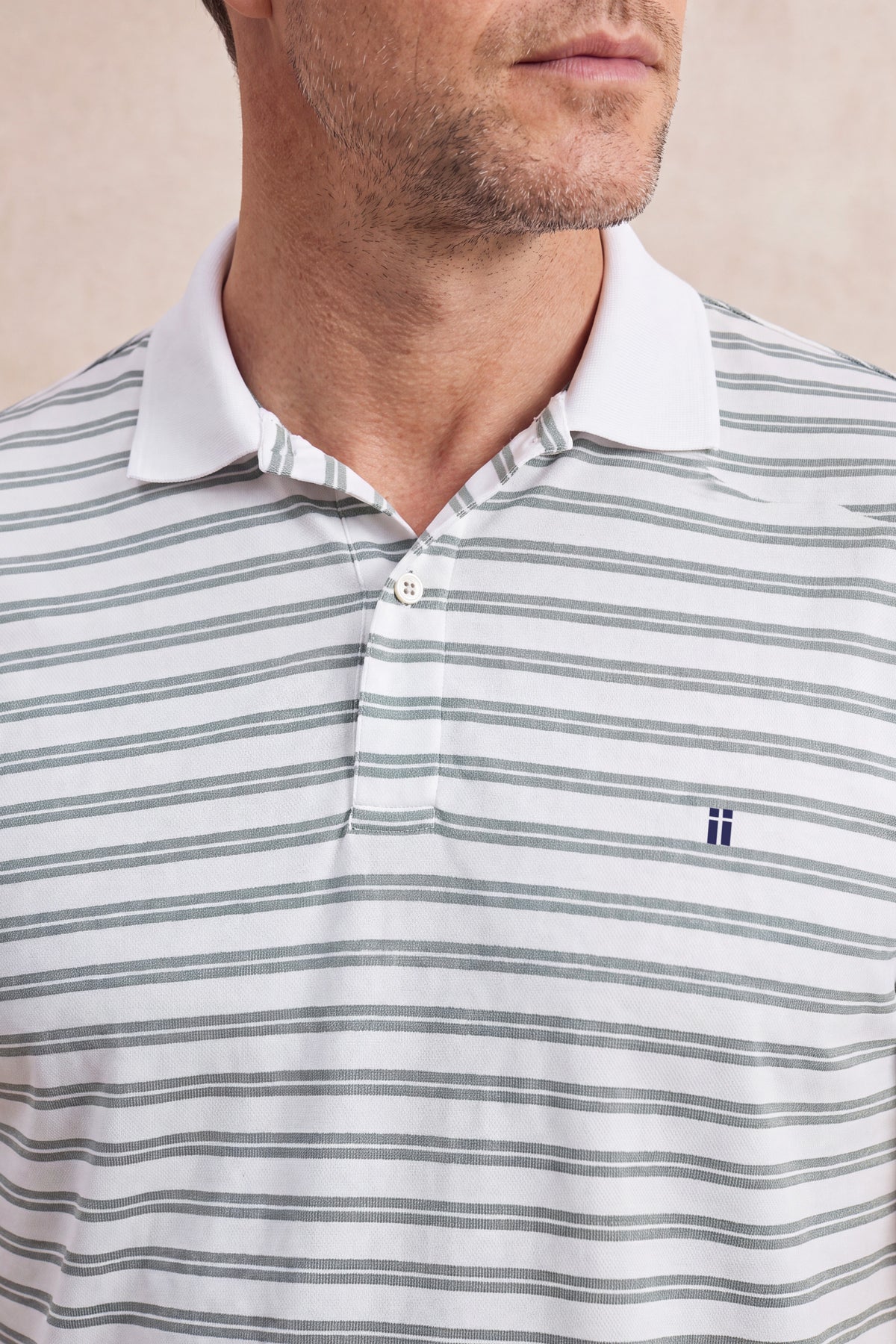 Camisa polo masculina com listras verdes
